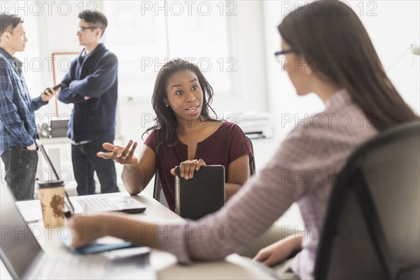 Businesswomen working together in office