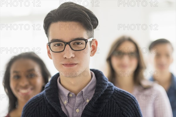 Close up of smiling businessman in office