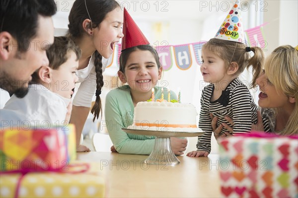 Caucasian family celebrating at birthday party