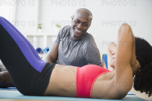 Couple talking in gym