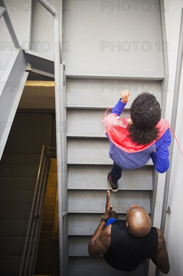 Couple jogging on staircase