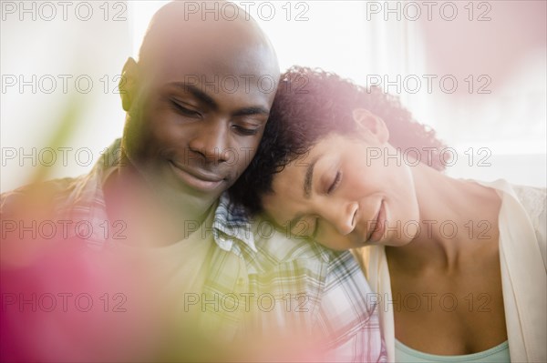 Close up of relaxing couple hugging