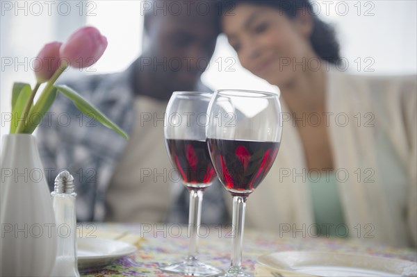 Couple with red wine in restaurant