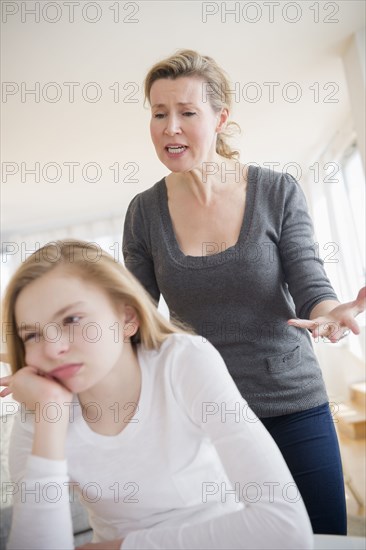 Caucasian mother arguing with daughter