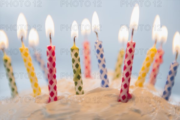 Close up of birthday candles in cake