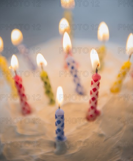 Close up of birthday candles in cake