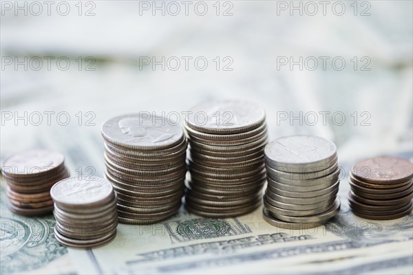 Close up of stacks of coins and money