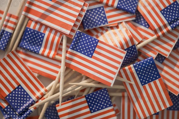 Close up of pile of American flags