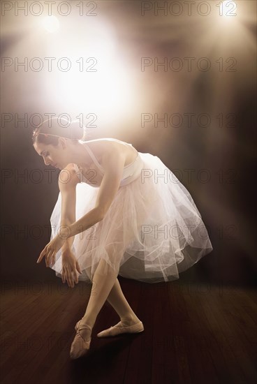 Hispanic ballet dancer performing on stage