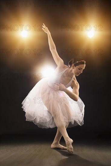 Hispanic ballet dancer performing on stage