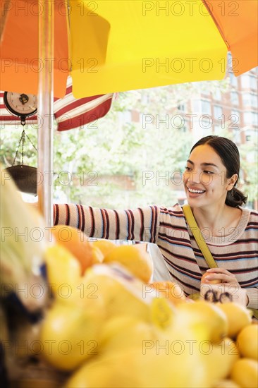 Hispanic woman shopping at farmers market