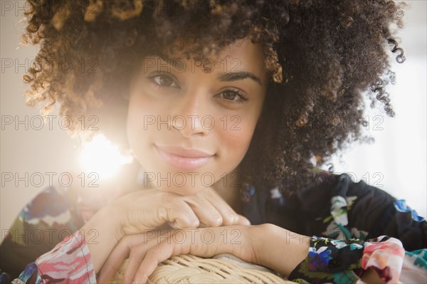 Close up of smiling mixed race woman