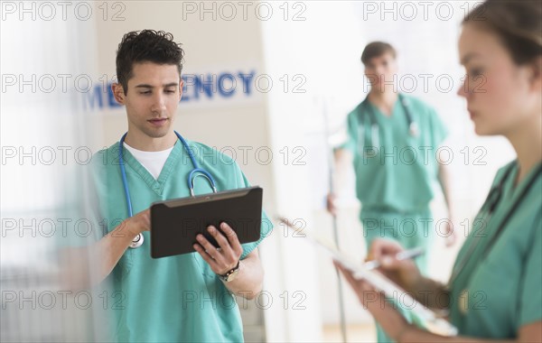 Doctors working in hospital emergency room