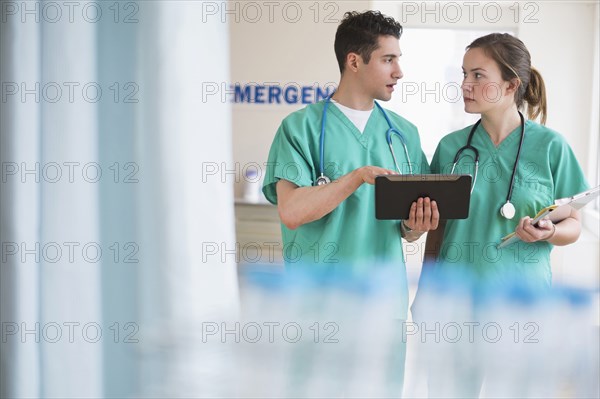 Doctors talking in hospital emergency room