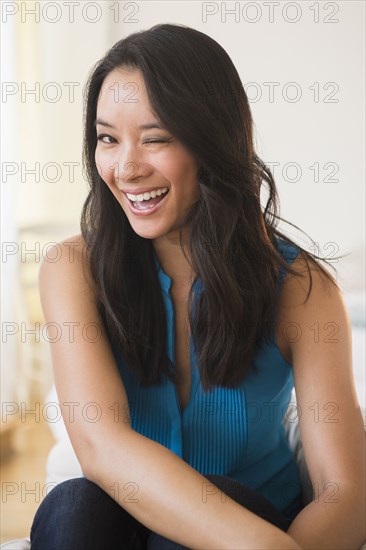 Chinese woman winking