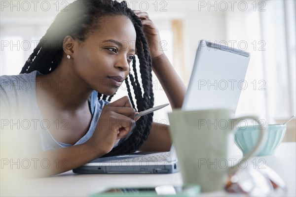 Black woman using laptop