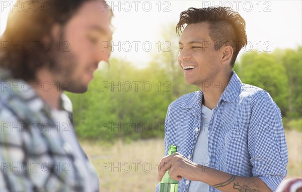 Man drinking beer outdoors