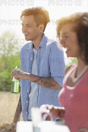 Man drinking beer outdoors