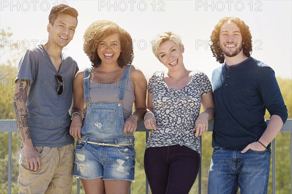 Friends smiling outdoors