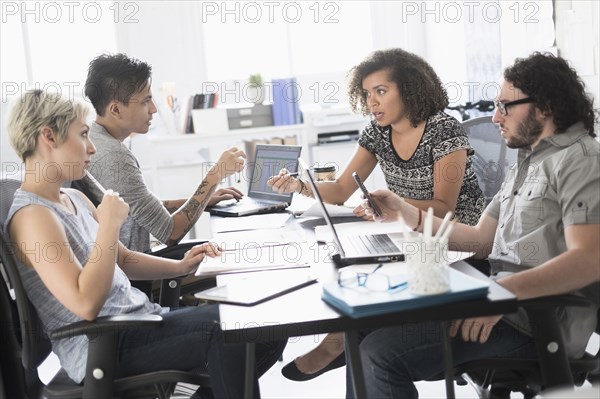 Business people talking in meeting