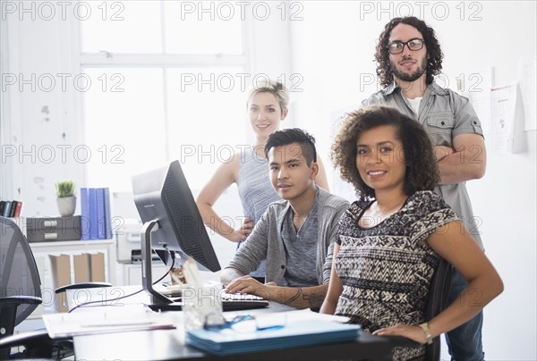 Business people smiling in office