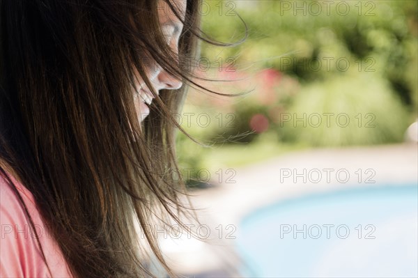 Profile of Caucasian woman outdoors