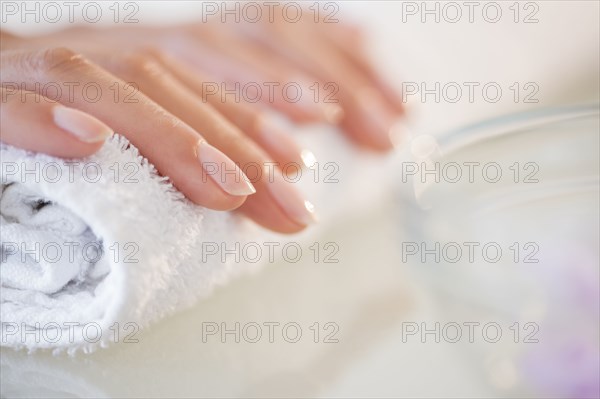 Close up of hands of Hispanic woman