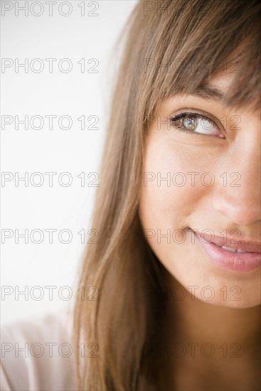 Mixed race woman looking away