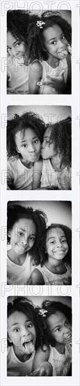 Photo strip of mixed race sisters