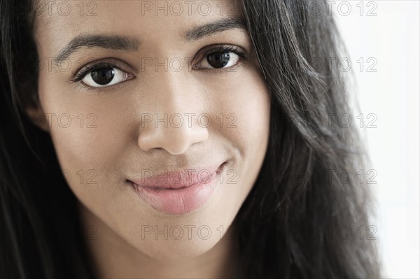 Close up of mixed race woman smiling