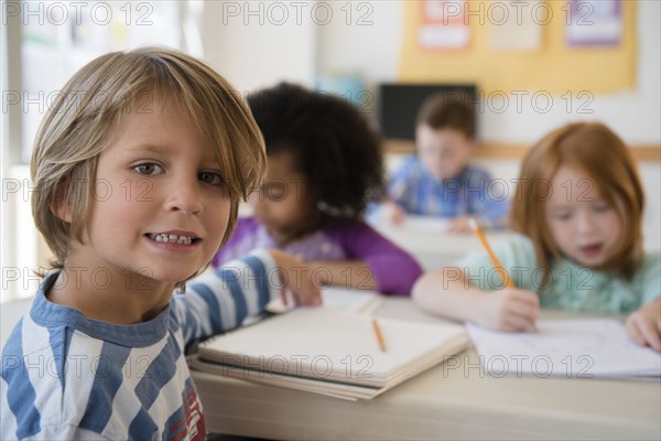 Student smiling in classroom