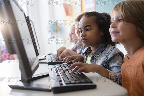 Students using computers in classroom