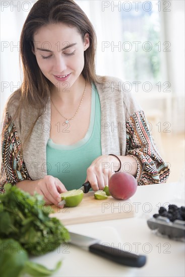 Native American woman chopping vegetables