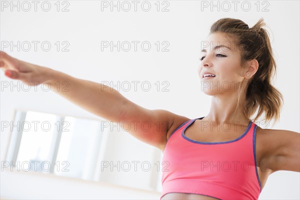 Mixed race woman working out