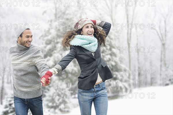 Couple walking in snow