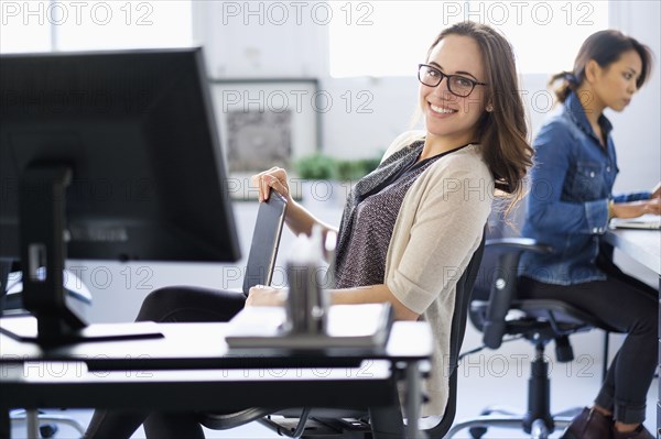 Businesswoman smiling in office