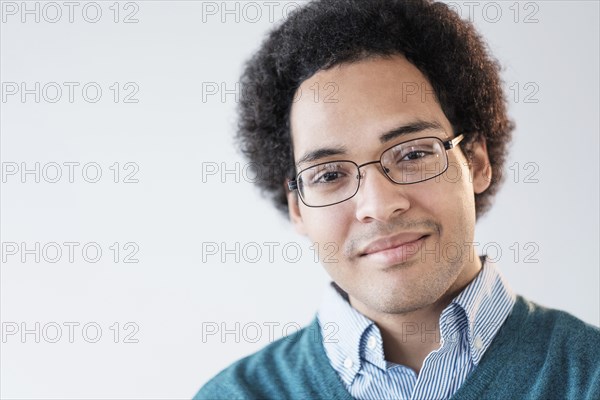 Mixed race man smiling