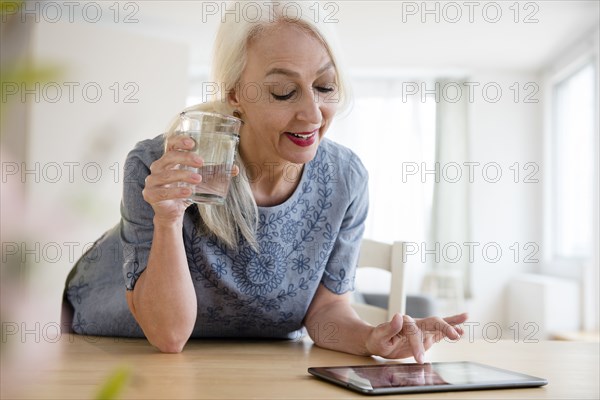 Caucasian woman using digital tablet