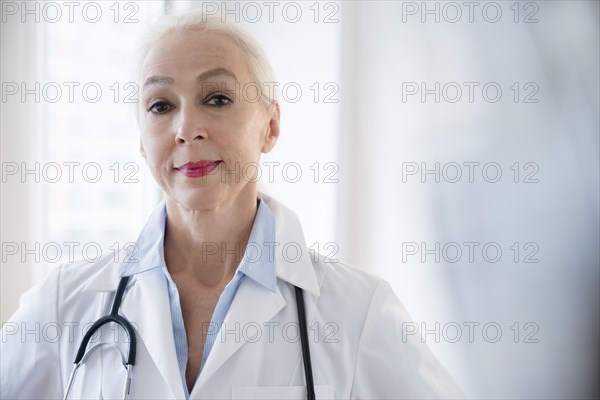 Caucasian doctor wearing stethoscope