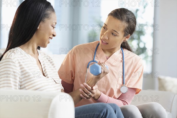 Patient having physical therapy in living room