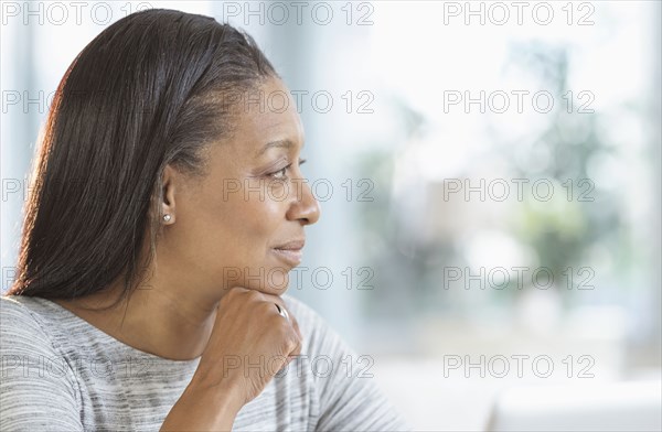 Close up of smiling mixed race woman