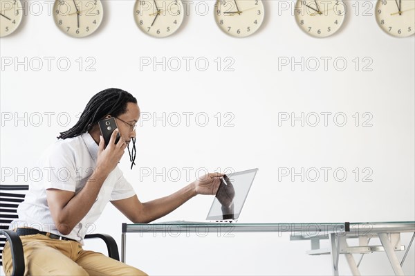 Black businessman working in office