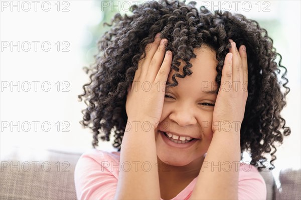 African American girl tossing her hair