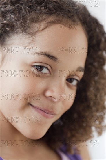 Close up of mixed race girl smiling