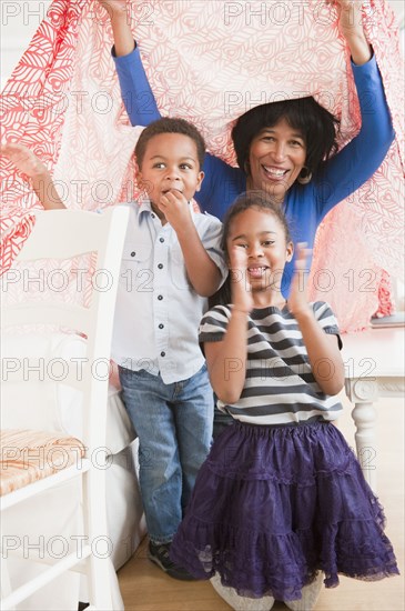 African American grandmother playing with grandchildren