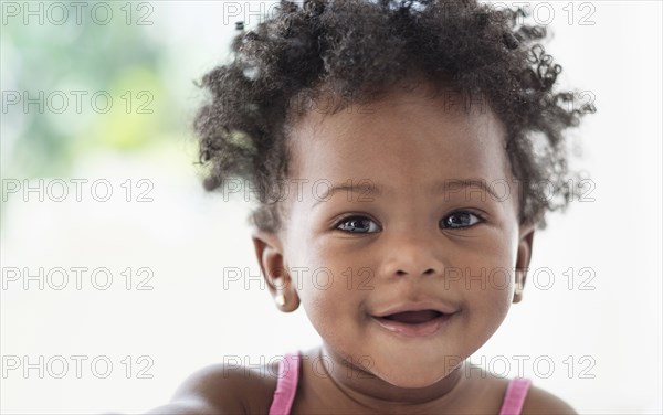 Smiling Black baby girl