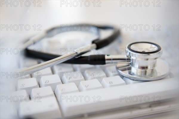 Stethoscope on computer keyboard