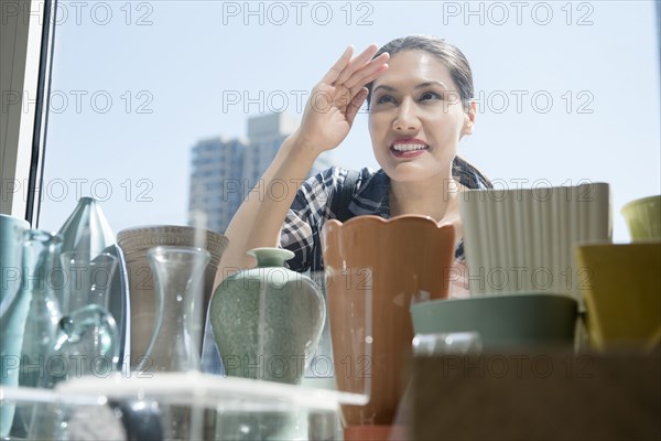 Curious Mixed Race woman window shopping