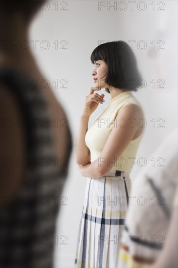 Portrait of pensive Hispanic woman