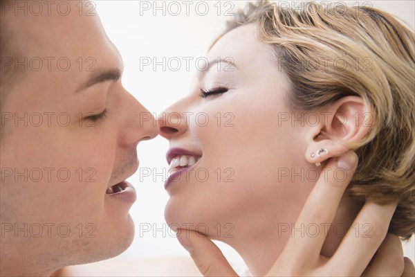 Caucasian couple kissing